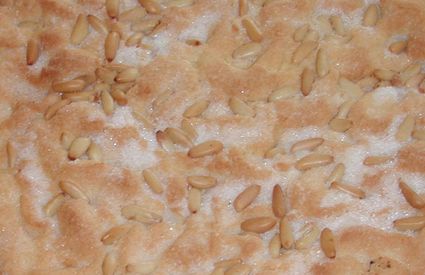 The typical dessert, with lard, pine nuts, eggs and sugar, the "Schiaccia Campigliese"